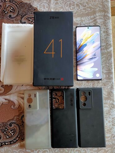 телефон fly bl9200: ZTE Axon 41 Ultra 5G, 512 ГБ, цвет - Черный, Отпечаток пальца, Две SIM карты, Face ID