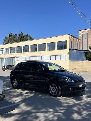volkswagen tiguan 150 л с: Nissan Tiida: 1.5 л | 2011 г. Хэтчбэк — 8