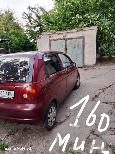 хундай елентро: Автомобиль Daewoo Damas бордового цвета, компактный и маневренный
