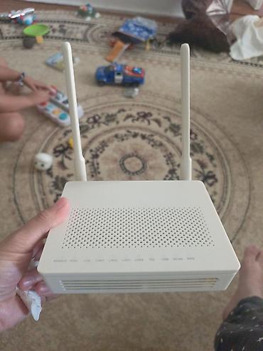 ipad ucuz: İki antenli Wi‑Fi marşrutizator/ONT Xüsusiyyətlər: - İki ədəd yüksək — 1