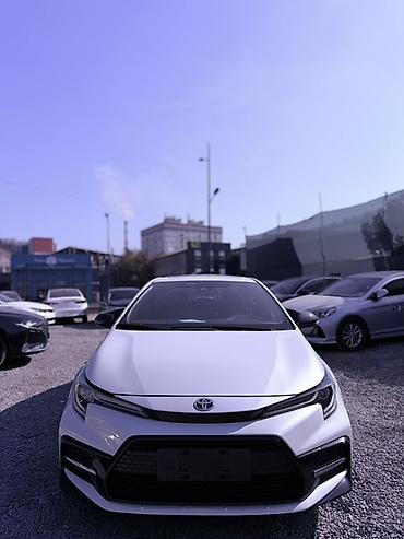 es гибрид: Toyota Corolla: 2021 г., 2 л, Вариатор, Гибрид, Седан — 1