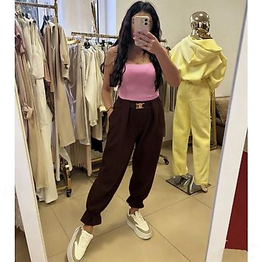 Pantalone: ✅Ženske široke pantalone sa karnerima na nogavicama i kaišem
✅2400 din — 3