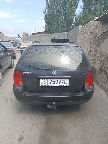 опель внедорожник: Универсал Volkswagen Passat черного цвета. Автомобиль оснащен