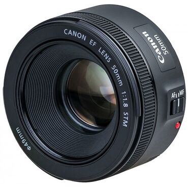 пленочные фотоаппараты: Универсальный объектив Canon EF 50mm f/1.8 STM предназначен для камер