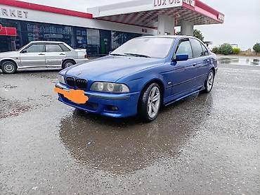bmw spoler: BMW 5 Seriyası (E39) sedan – mavi rəngdə. Xüsusiyyətlər: - Geniş və — 2