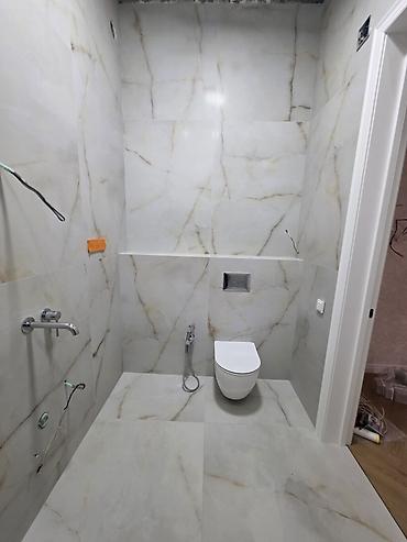 Укладка плитки: Профессиональная укладка крупноформатного керамогранита и плитки под — 15