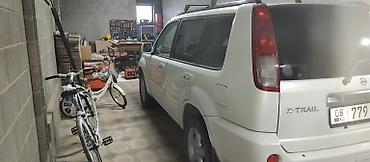 защитник: Nissan X-Trail: 2004 г., 2 л, Автомат, Газ, Кроссовер — 1