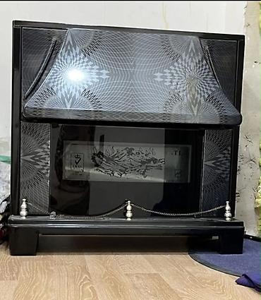 Qaz sobası/kamin tipli isitmə qurğusu - Klassik qara korpus, yüksək lalafo.az -da Qaz sobası/kamin tipli isitmə qurğusu - Klassik qara korpus, yüksək