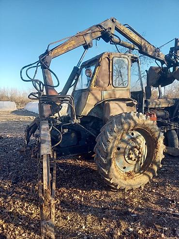 Ekskavatorlar: Ekskavator-yükleyici (traktor bazalı) – ön bıçaq və arxa ekskavator — 7