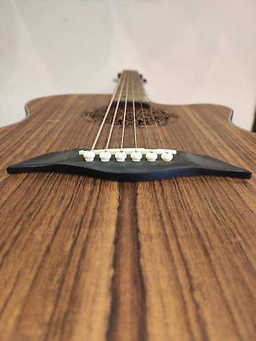 fender gitara: Elektro akustik gitara Model:LG-09 Simlərin sayı: 6 Üst: Qoz ağacı — 1