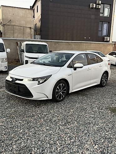 Toyota: Toyota Corolla: 2023 г., 1.8 л, Гибрид, Седан — 2