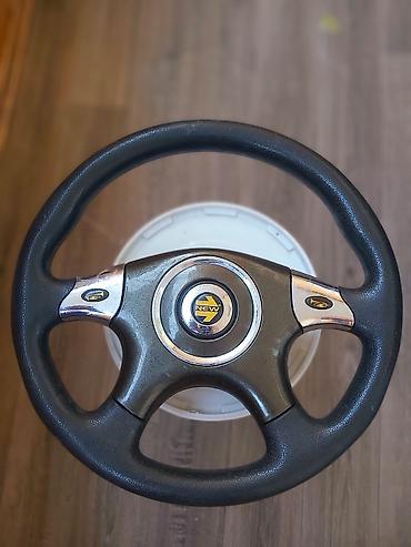 sukanlar: Opel Astra sükan - Material: qara teksturalı poliuretan/deri tərzində — 1
