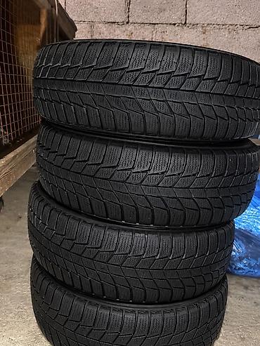 титан мазда 15: Комплект зимних шин без шипов (studless), размер 195/70 R14 92R — 2