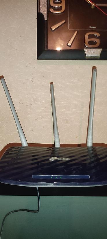 modem ustası: TP-Link Wi‑Fi marşrutizatoru (3 antenalı) - Model: Archer seriyasına — 2