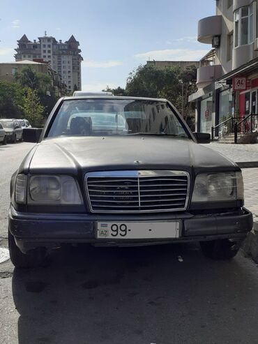 krılo: Mercedes-Benz E 230: 2.3 l | 1990 il Sedan