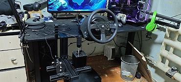 Рули: Комплект для симрейсинга Thrustmaster + аксессуары Состав: - Руль — 2