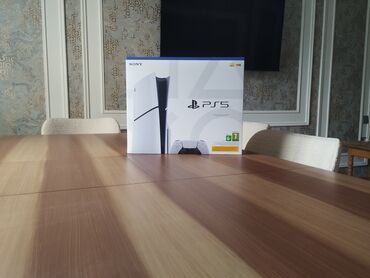 PS5 (Sony PlayStation 5): Ps 5 slim 1 tb dünən alınıb 1 illik rəsmi zəmanəti var alan adama