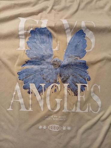 Футболки: Три футболки (черная уже продана) Размер указан на ярлыках на фото — 3