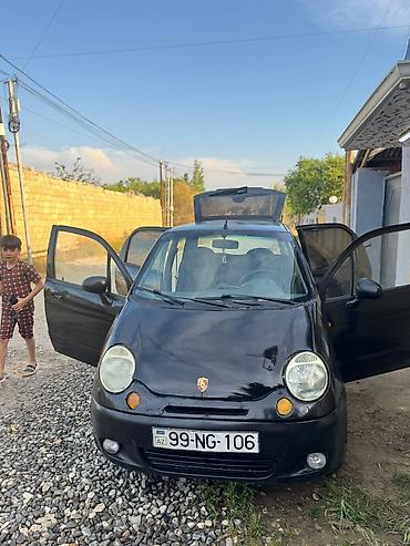 nexia daewoo: Şəhər içi istifadə üçün uyğun, qara rəngli Daewoo Matiz — 1
