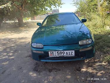 зарядка электровелосипеда: Mazda 323: 1996 г., 1.8 л, Механика, Бензин, Седан — 7