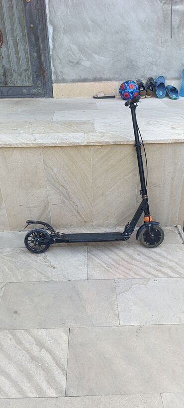 Другое для спорта и отдыха: Nanrobot markalı bu qara skuter şəhər gəzintiləri üçün ideal seçimdir
