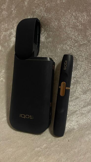 iqos aparat: Iqos plus 2.4 baterekasi deyismek lazimdir 20manat xerci var