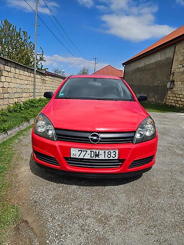 Opel: Opel Astra H hatchback – parlaq qırmızı rəngdə, 5 qapı. Texniki — 2