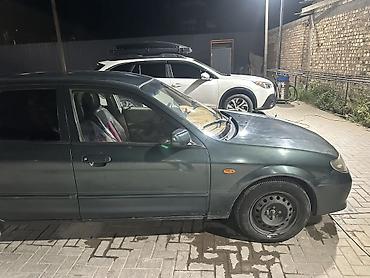 мата секыл: Mazda 323: 2002 г., 1.6 л, Автомат, Бензин, Хетчбек — 1