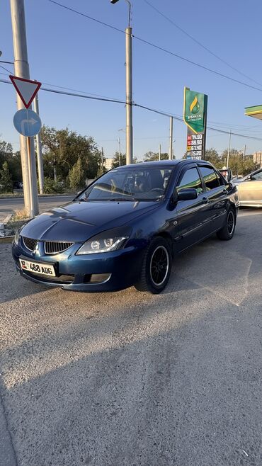 шины на масквич: Mitsubishi Lancer: 2005 г., 1.6 л, Механика, Бензин, Седан