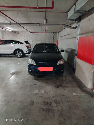 Toyota: Toyota Corolla: 1.4 l | 2004 il Sedan — 12