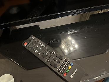 pultu: Zimmer LED televizor + pult - Ekran: təxminən 32" LED panel — 2