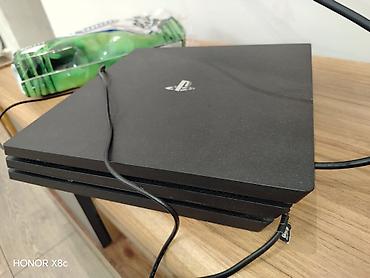 oyun direksiyonu: PlayStation 4 Pro oyun konsolu. Əla vəziyyətdə, 2 orijinal pultla - — 2