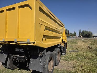 оператор эксковатора: Самосвал КАМАЗ, жёлтый, колесная формула 6x4. Основные характеристики — 3