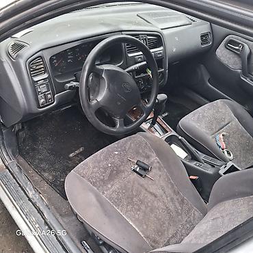 chek it: Nissan Primera: 1996 г., Автомат, Бензин, Седан — 7