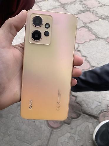 amazfit trex 3 pro: Смартфон Redmi (золотистый/перламутровый градиент). - Экран с тонкими — 1