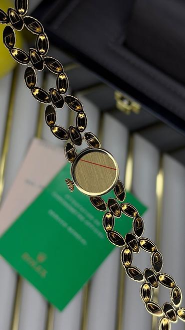 zinet: Rolex qadın qol saatı zərif və klassik dizaynı ilə seçilir. Model — 6