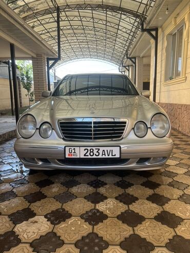 домкрат для авто: Седан Mercedes-Benz E-Class (W210) в серебристом цвете год выпуска