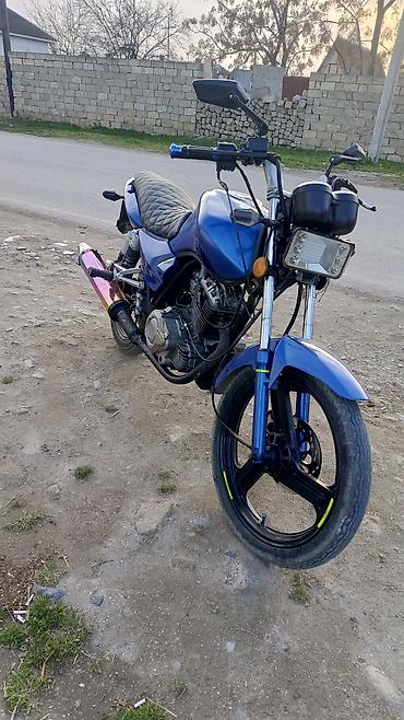 Мотоциклы: Mavi rəngli yol tipli motosiklet Texniki və dizayn xüsusiyyətləri: - — 3