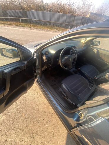 Opel: Model: Opel Astra Caravan (universal kuzov) Rəng: tünd boz Yanacaq — 6