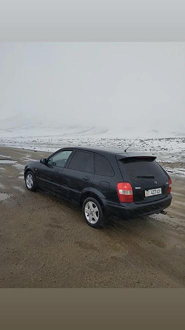 наклейки бмв: Mazda 323: 1999 г., 1.5 л, Механика, Бензин, Универсал — 4