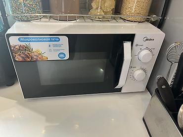 Микроволновая печь Midea, объем 20 л. Особенности и функции: -