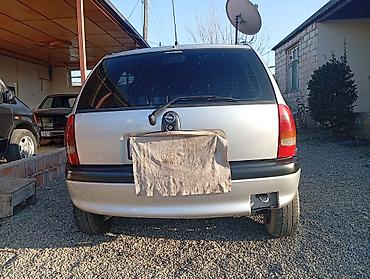 Opel: Opel Corsa B, 5 qapılı hetçbek - Kuzov: kompakt hetçbek, gümüşü rəng — 2