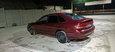 зикр машина: Mazda Cronos: 1994 г., 1.8 л, Механика, Бензин, Хэтчбэк