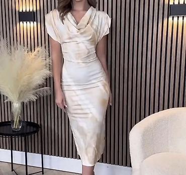 pheromone parfemi: Elegantna midi haljina s efektom tie-dye
1550
Din
S M L — 5