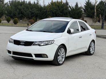 автомобиль: Kia Cerato: 1.6 л | 2009 г. Седан