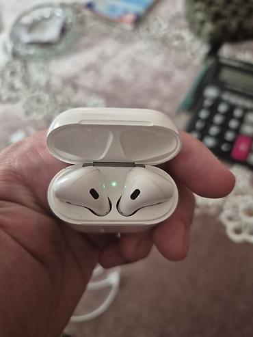 balaca quran kitabi: Apple AirPods (2-ci nəsil) – qutu komplekti Xüsusiyyətlər: - Simsiz — 5