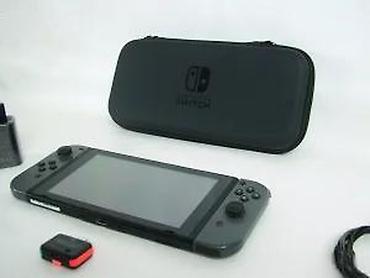 Nintendo Switch: Uz konzolu dolazi: Tablet (konzola) Joy-Con džojstici Punjač — 19