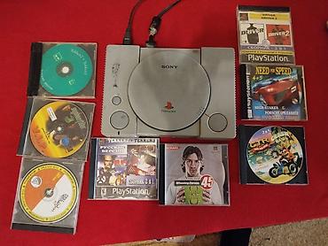 iphon 1: Sony PlayStation (PS1) konsolu + oyun diskləri seti Məzmun: - Sony — 1