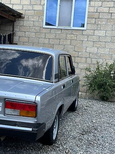 фольксваген тигуан л с: Lada (Rusiya istehsalı) sedan - Kuzov: 4 qapılı sedan, gümüşü rəng - — 2