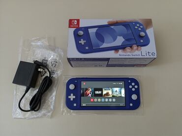 Nintendo Switch: Çipli Nintendo switch lite konsolu yeni bağlı qutusunda. Konsol